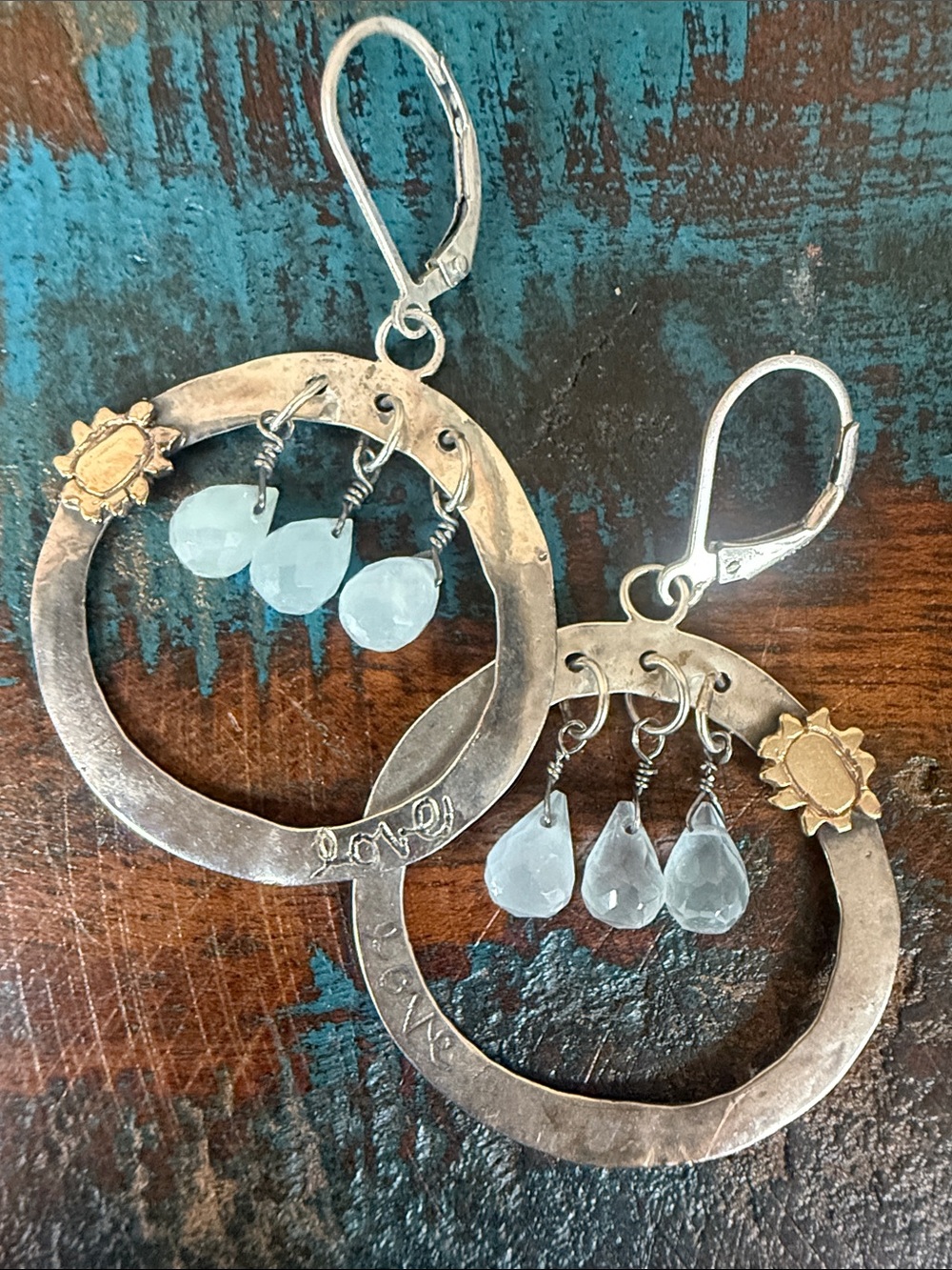 Jes MaHarry “Be Free” aquamarine silver and gold earrings.